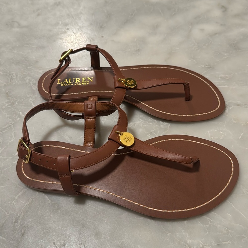 RALPH LAUREN brown leather and T strap sandals with RL medallion.